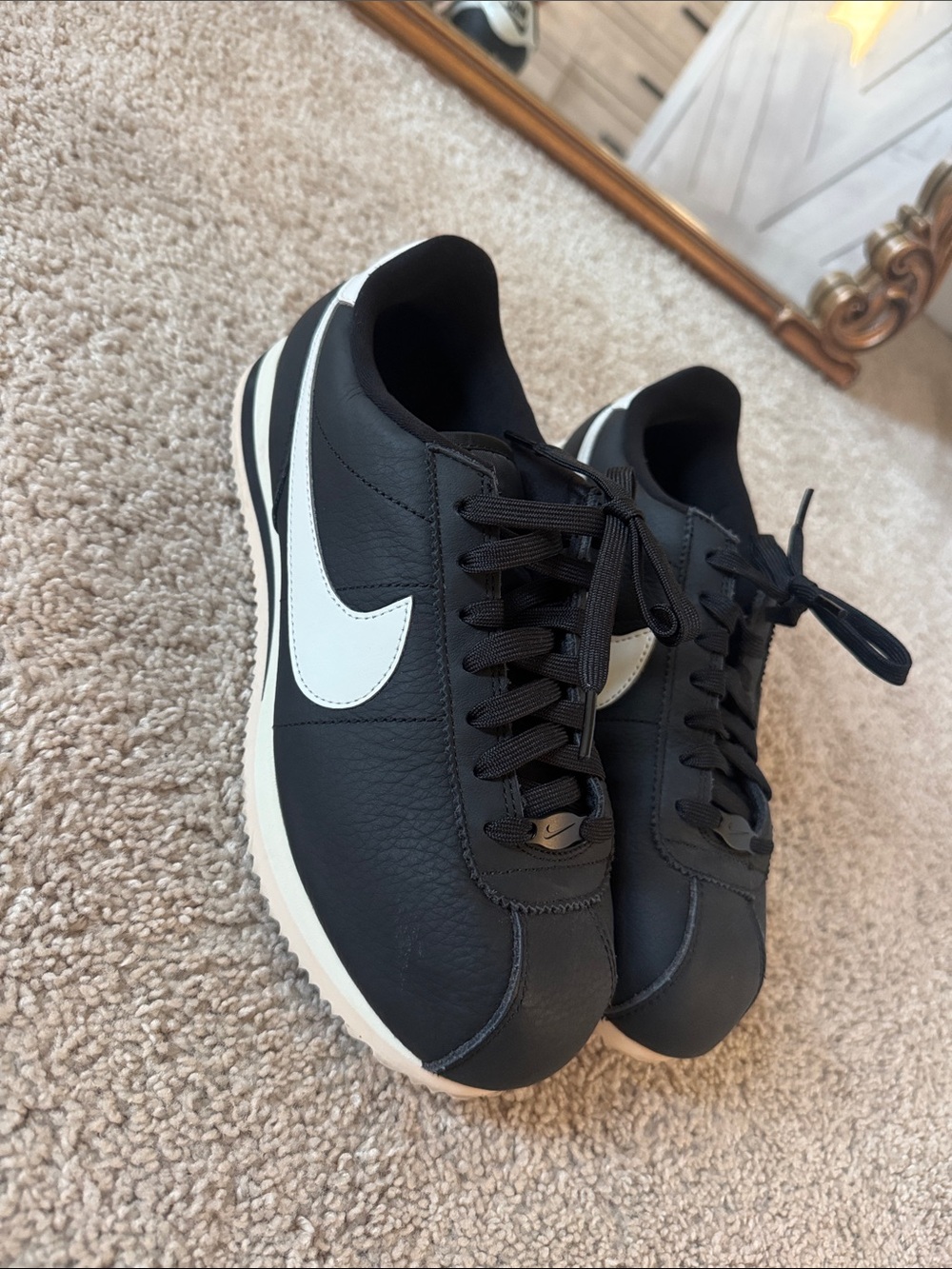 Women’s Nike Black Leather Sneakers with White Swoosh